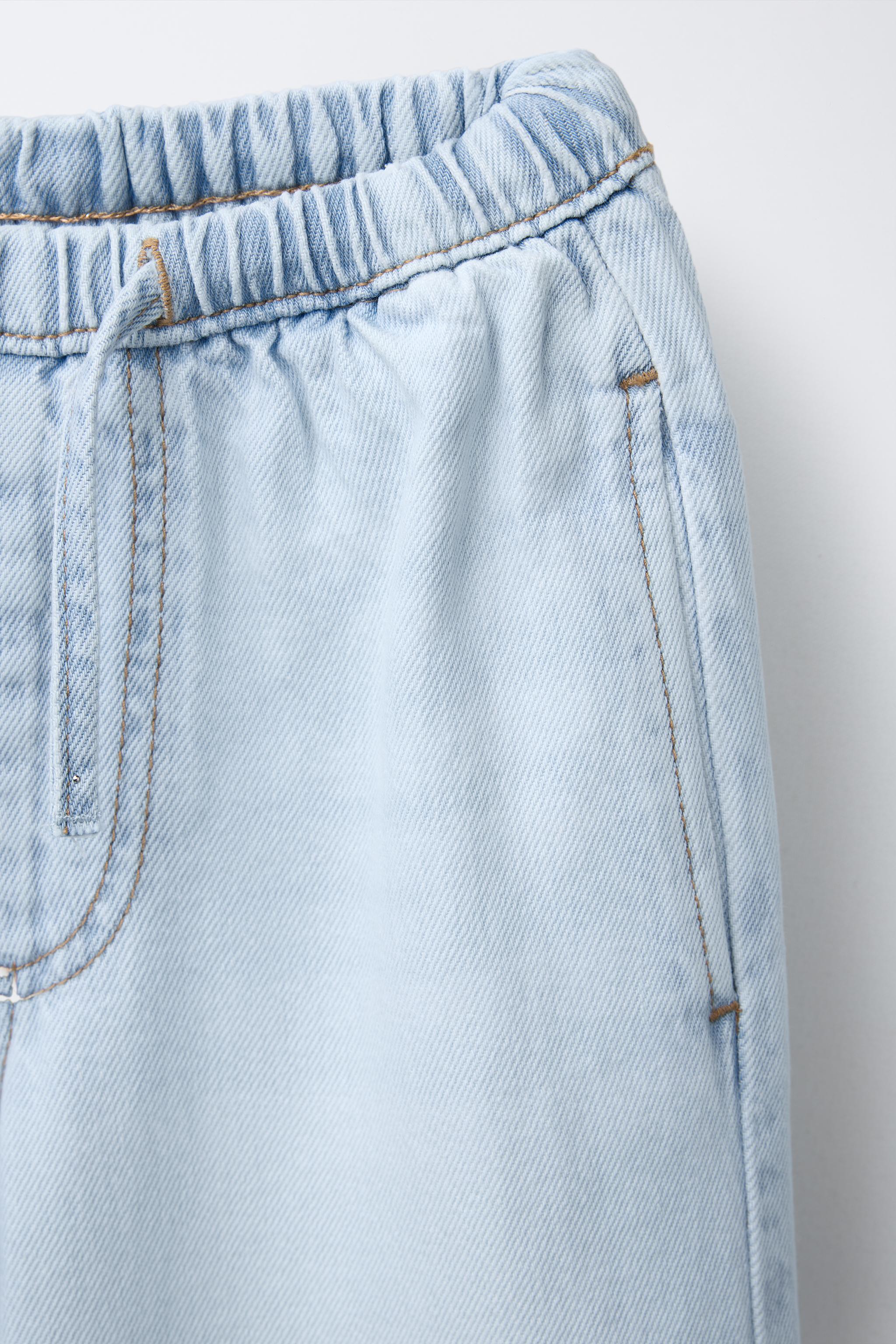 SLIM WAIST WIDE LEG JEANS